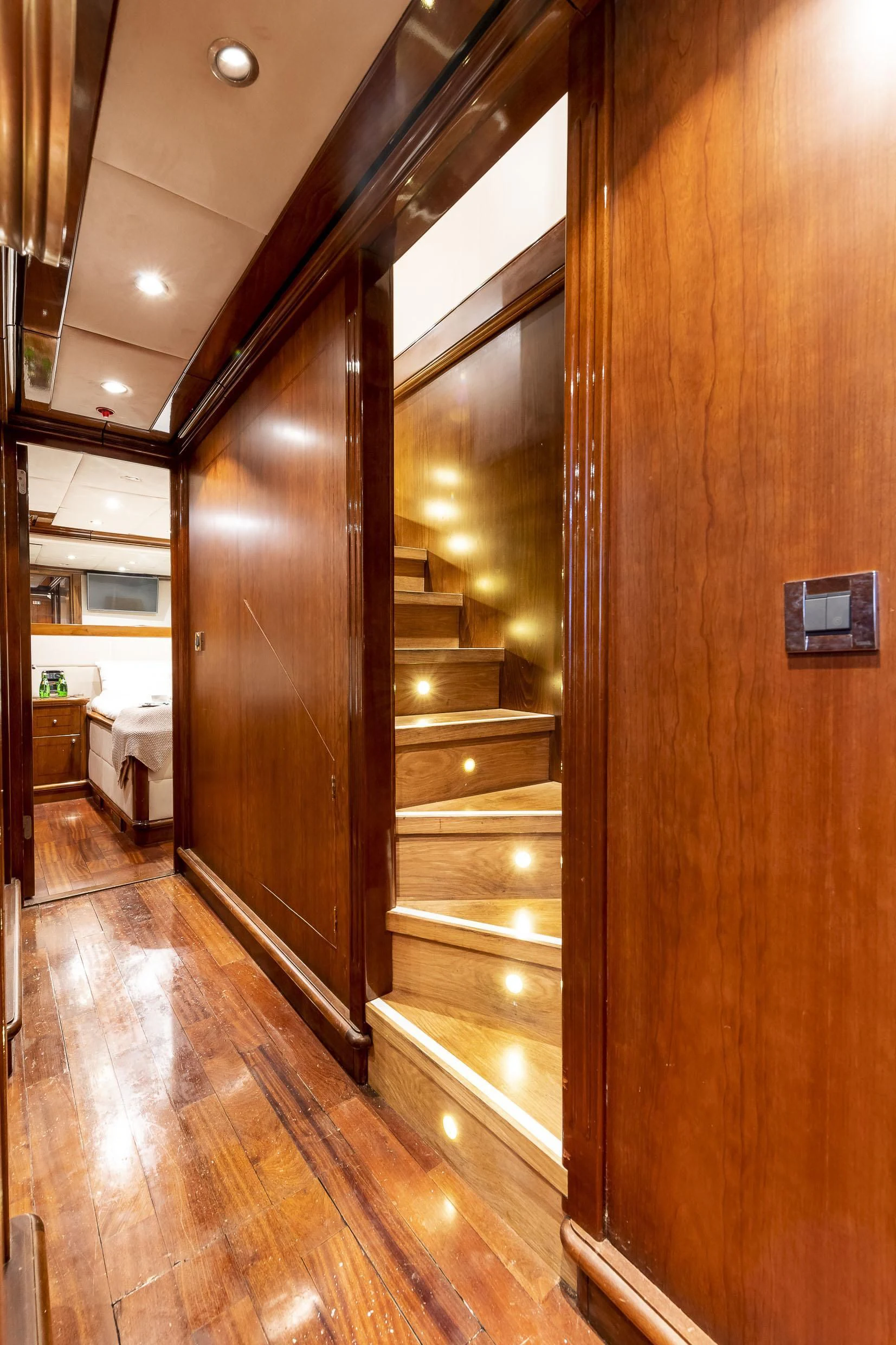 a wood hallway with a glass door aboard 2 LADIES Yacht for Sale