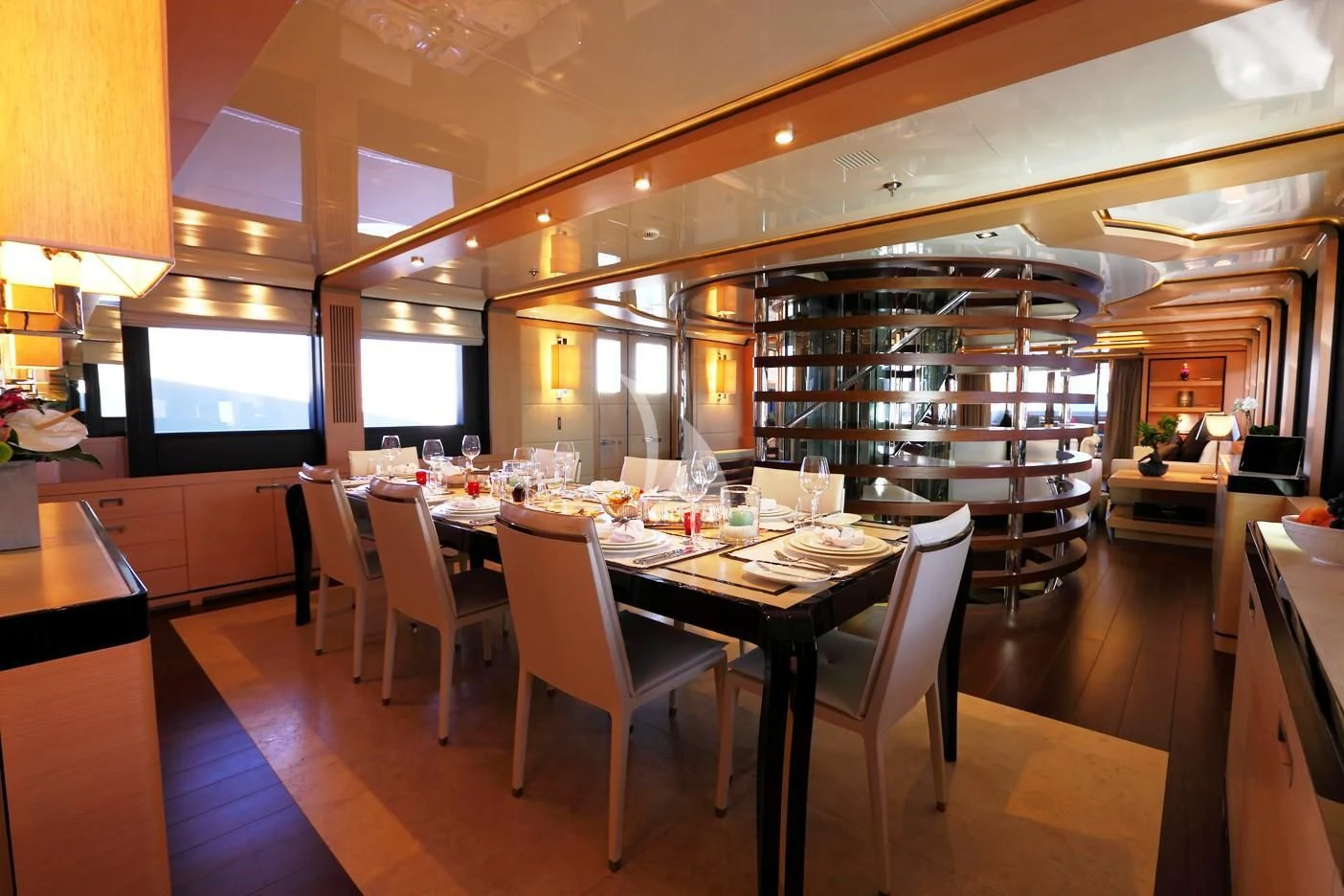 a large kitchen with a table and chairs aboard 2 LADIES Yacht for Sale