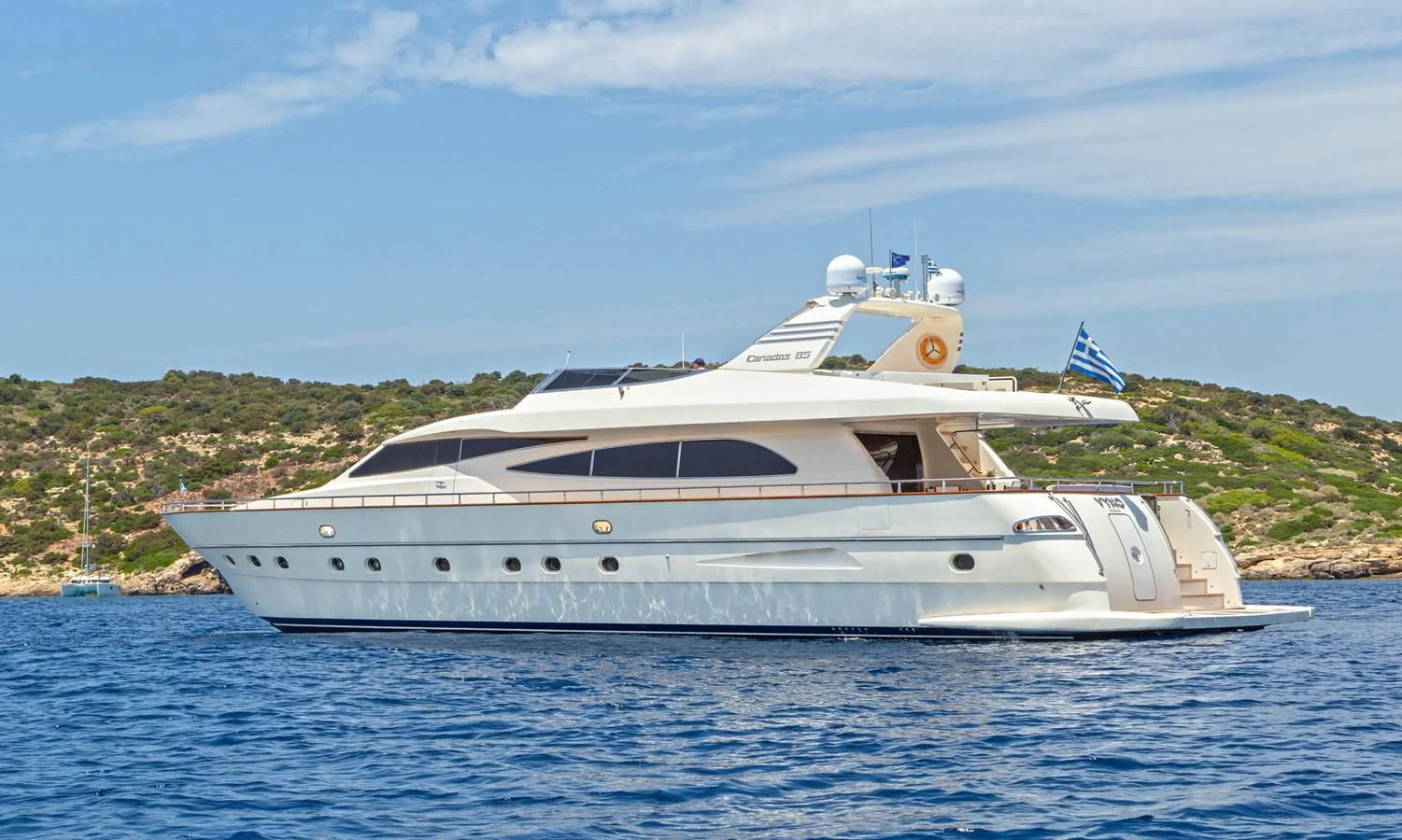 a large white yacht in the water aboard VYNO Yacht for Sale