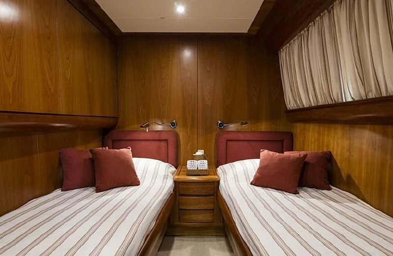 a couple of beds in a room aboard VYNO Yacht for Sale