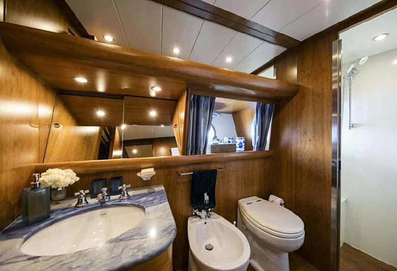a bathroom with a sink and toilet aboard VYNO Yacht for Sale