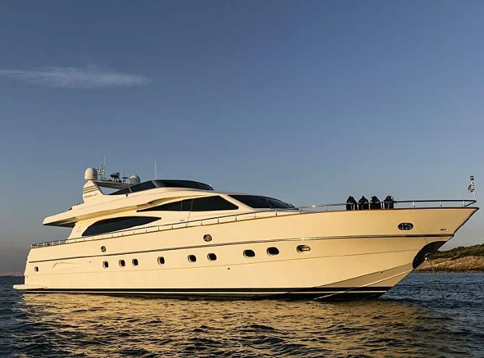 a white yacht on the water aboard VYNO Yacht for Sale