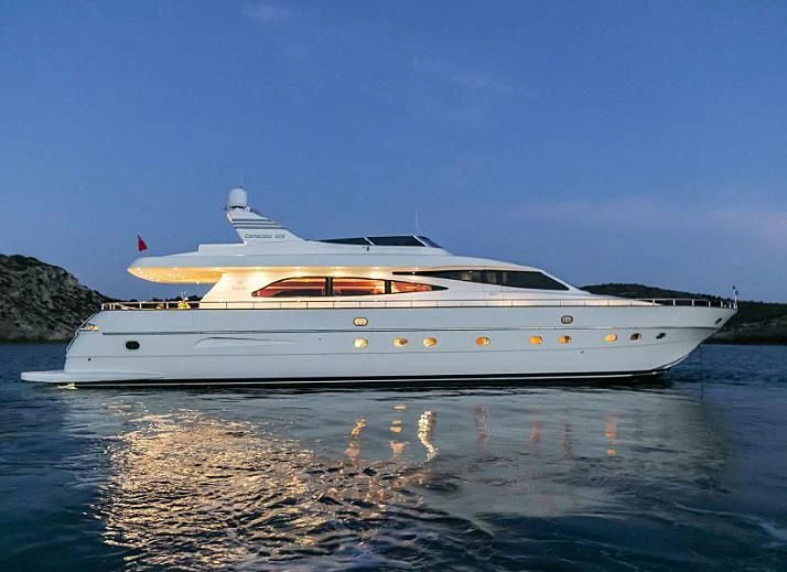 a white yacht on the water aboard VYNO Yacht for Sale