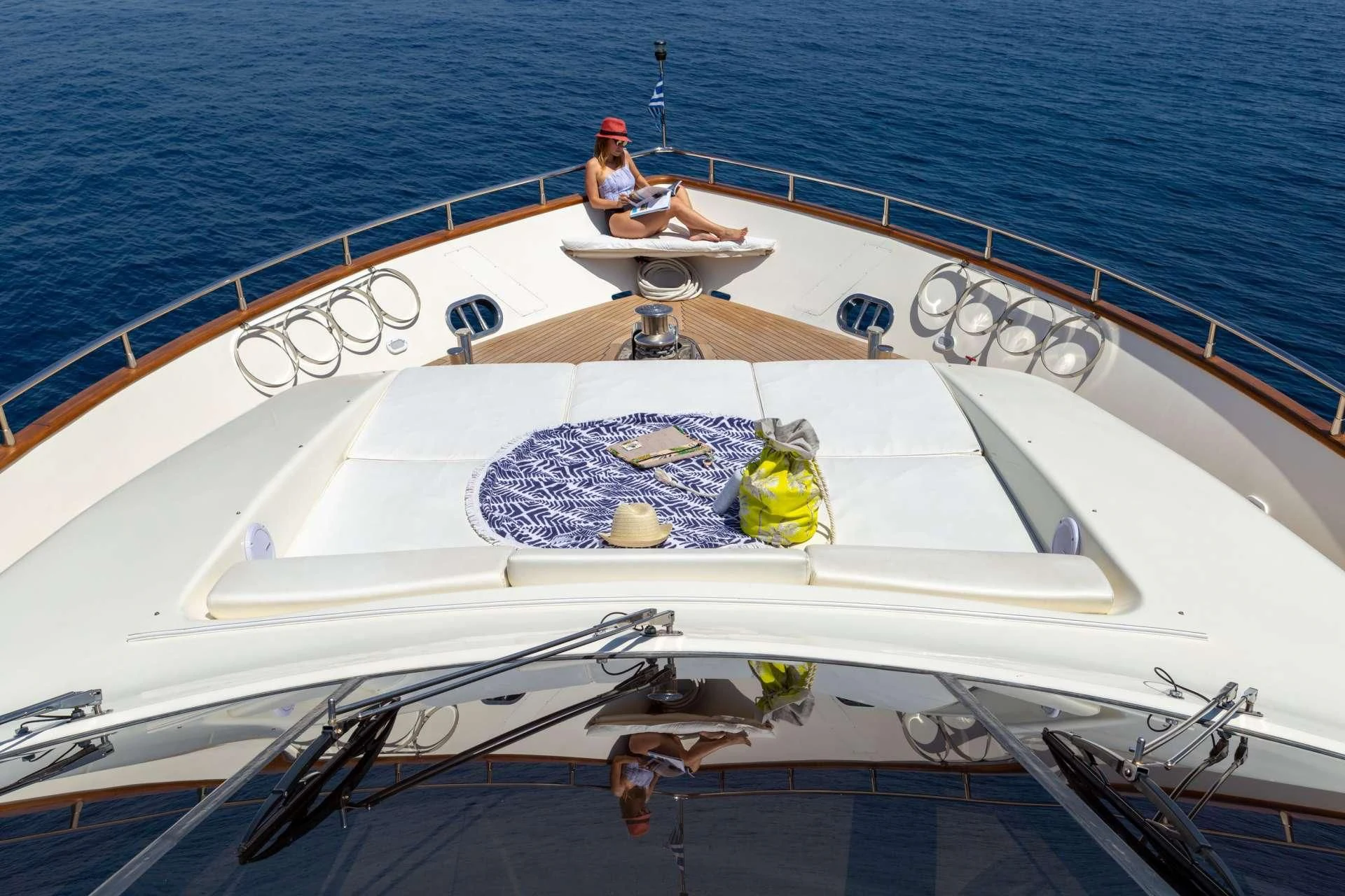 a person sitting on a boat aboard VYNO Yacht for Sale