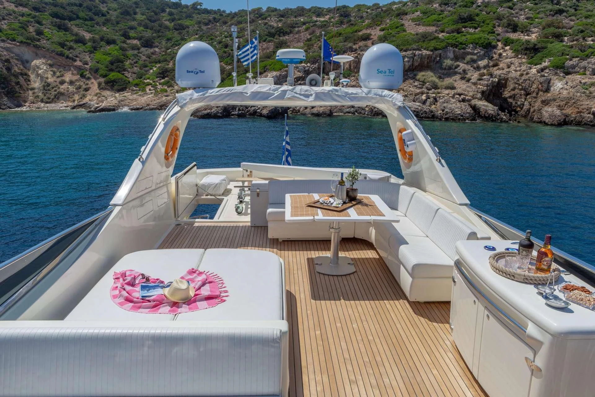 a boat with a table on it aboard VYNO Yacht for Sale