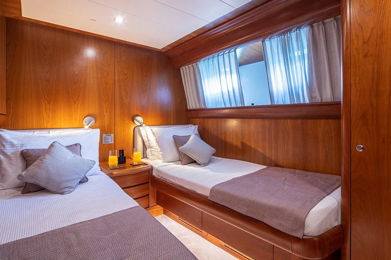a couple of beds in a room aboard VYNO Yacht for Sale