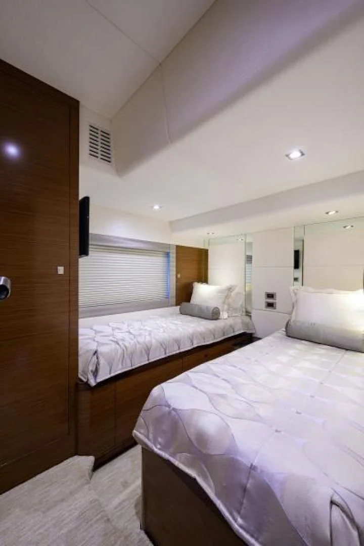 a room with two beds aboard JOHN BOAT Yacht for Sale