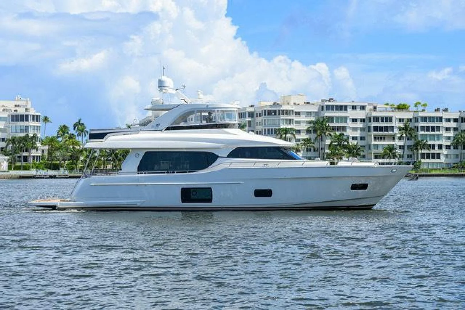 a white yacht on the water aboard JOHN BOAT Yacht for Sale