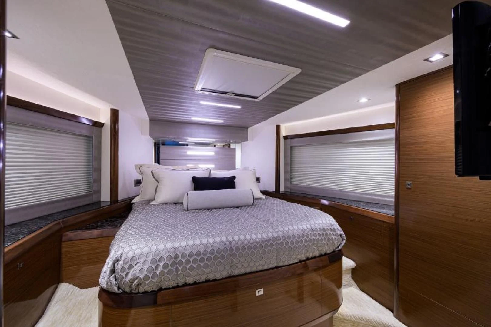 a bed in a room aboard JOHN BOAT Yacht for Sale
