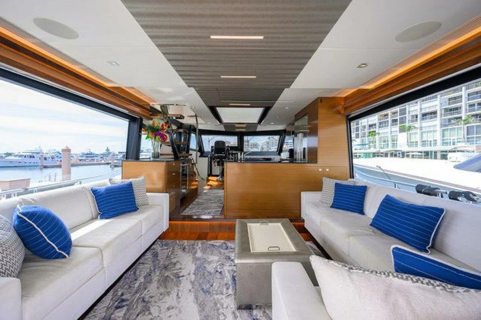 a room with a view of the ocean and the deck aboard JOHN BOAT Yacht for Sale