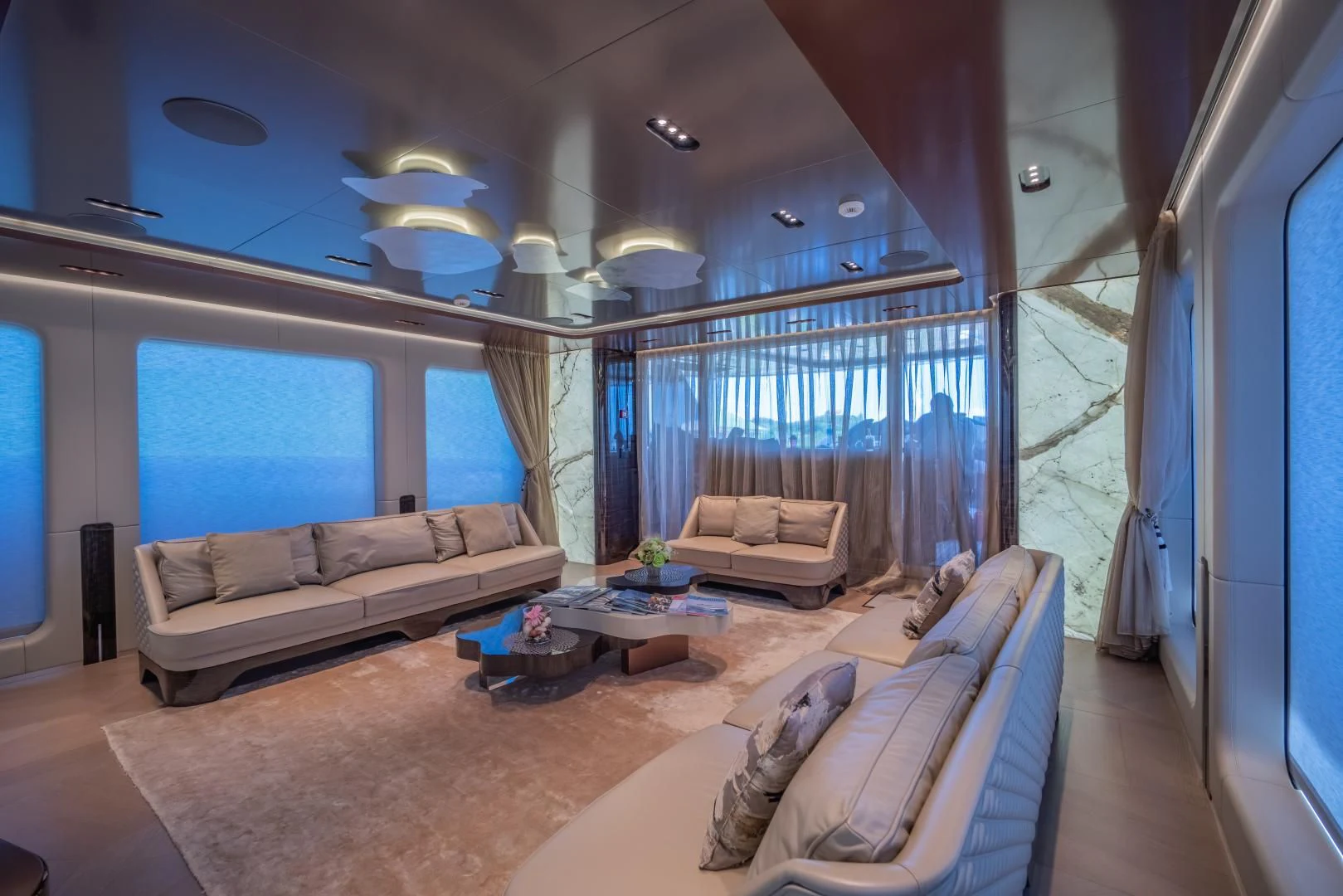a living room with a large window aboard LA VIE Yacht for Sale