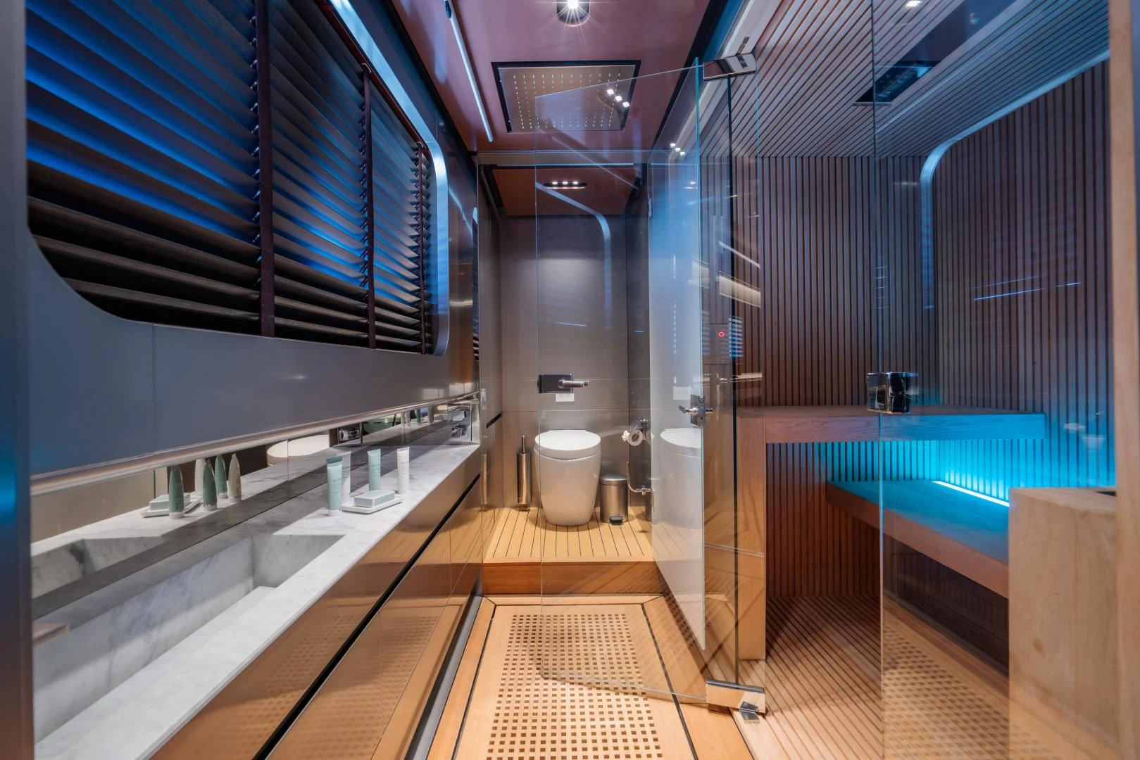 a bathroom with a tub sink and toilet aboard LA VIE Yacht for Sale