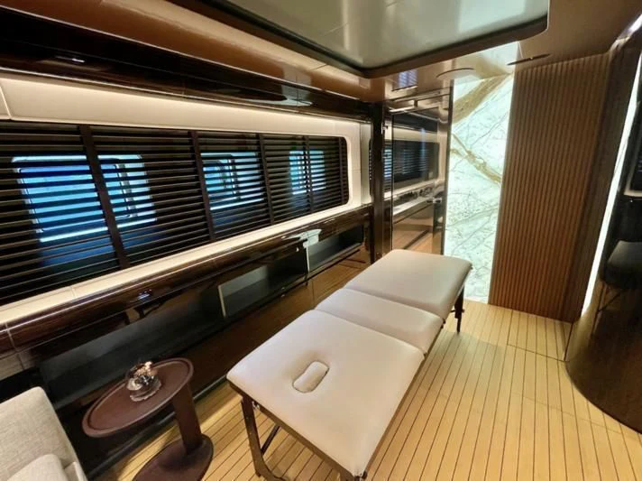 a room with a table and a window aboard LA VIE Yacht for Sale