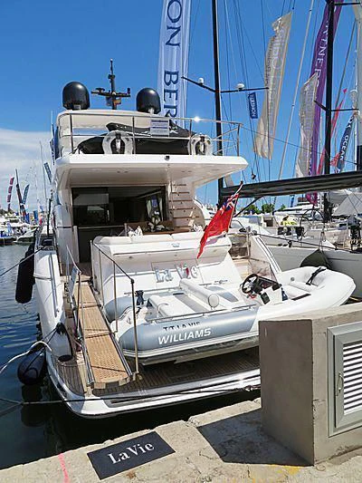 a boat docked at a dock aboard LA VIE Yacht for Sale