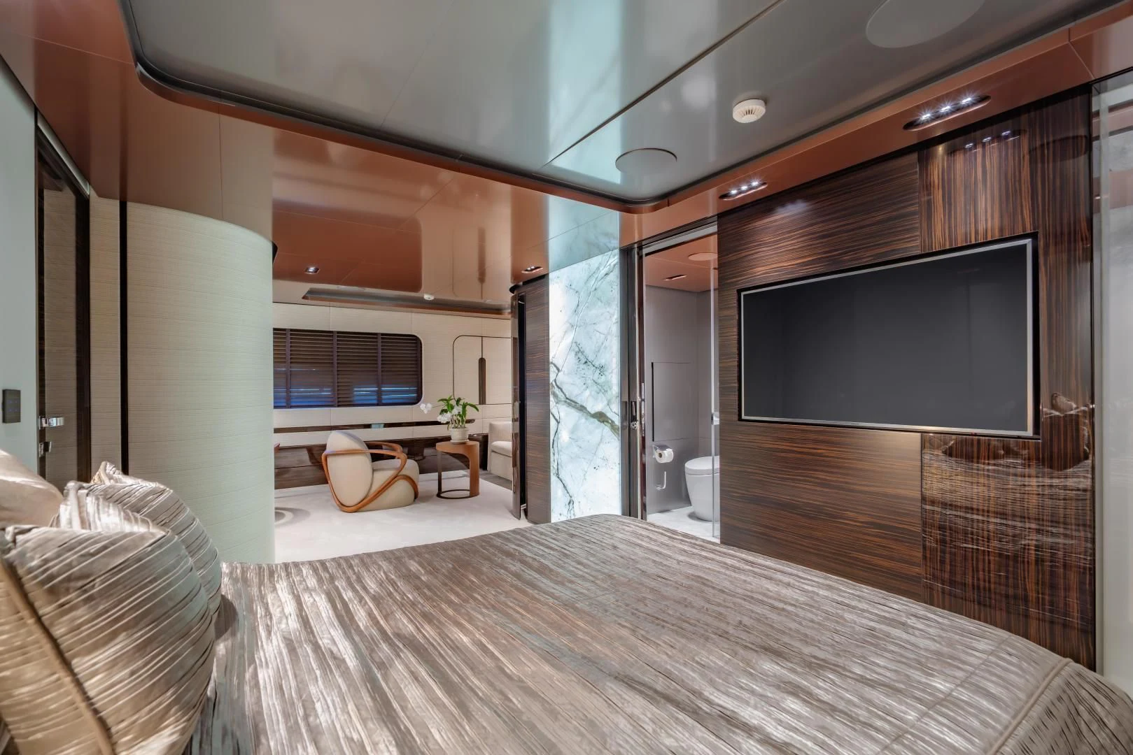 a room with a tv and furniture aboard LA VIE Yacht for Sale