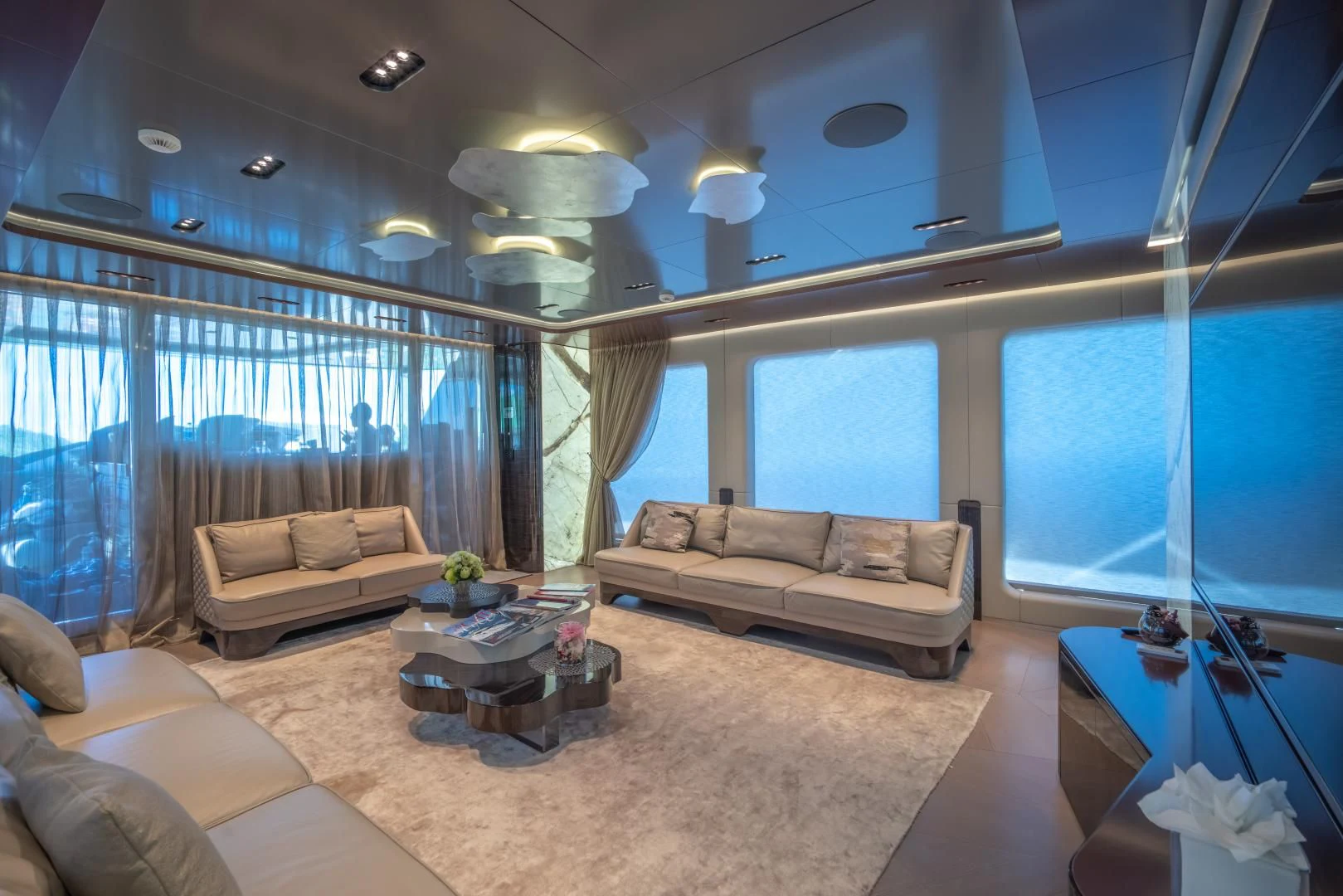 a living room with a large window aboard LA VIE Yacht for Sale