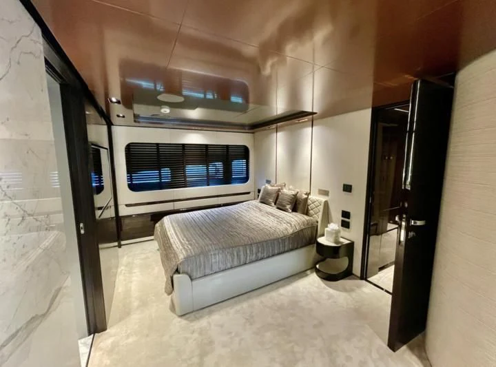 a bed in a room aboard LA VIE Yacht for Sale