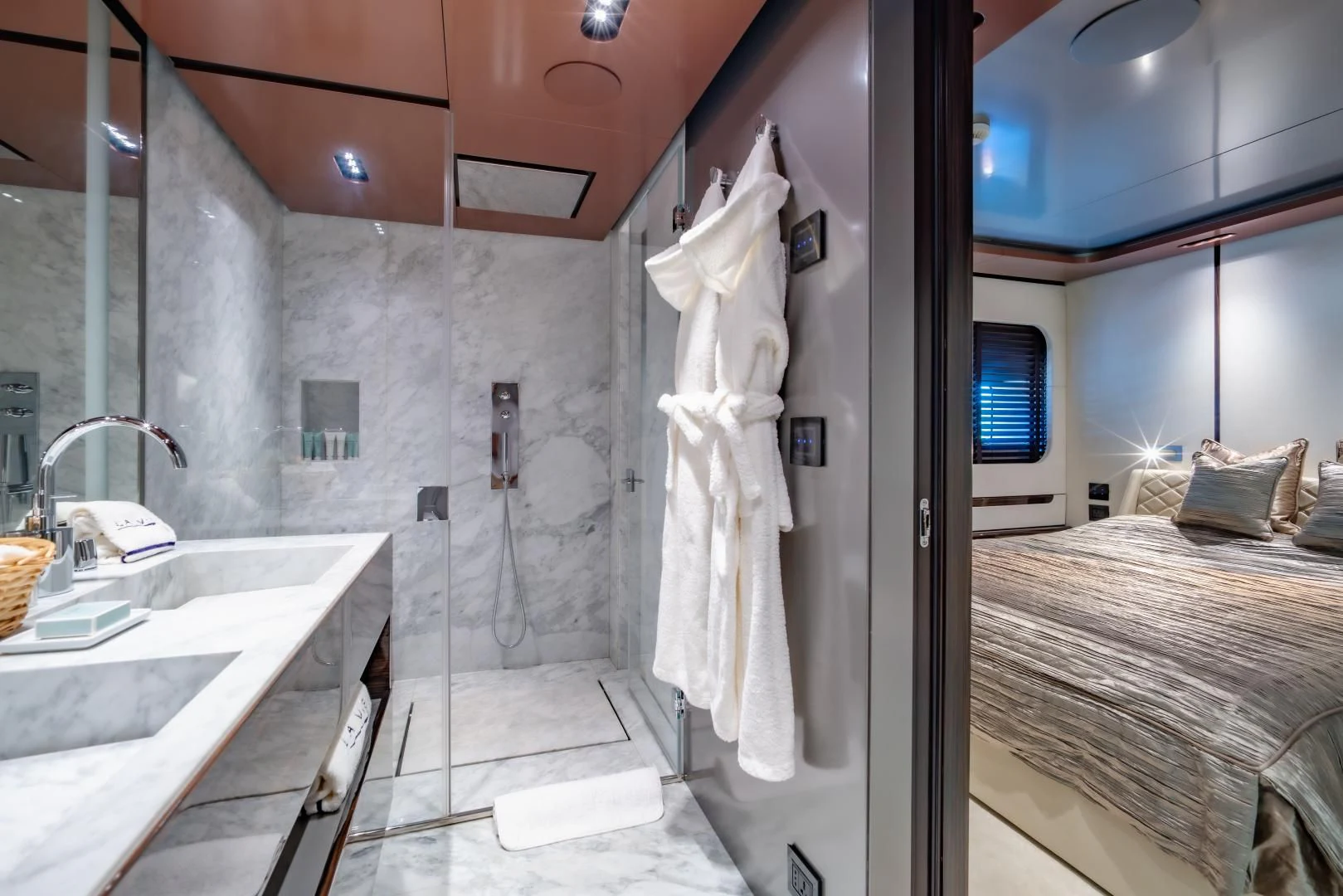 a bathroom with a sink and a mirror aboard LA VIE Yacht for Sale