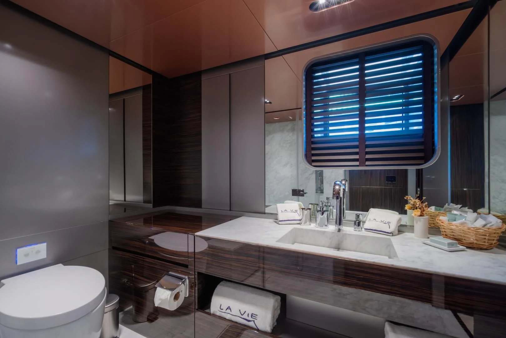 a bathroom with a large window aboard LA VIE Yacht for Sale