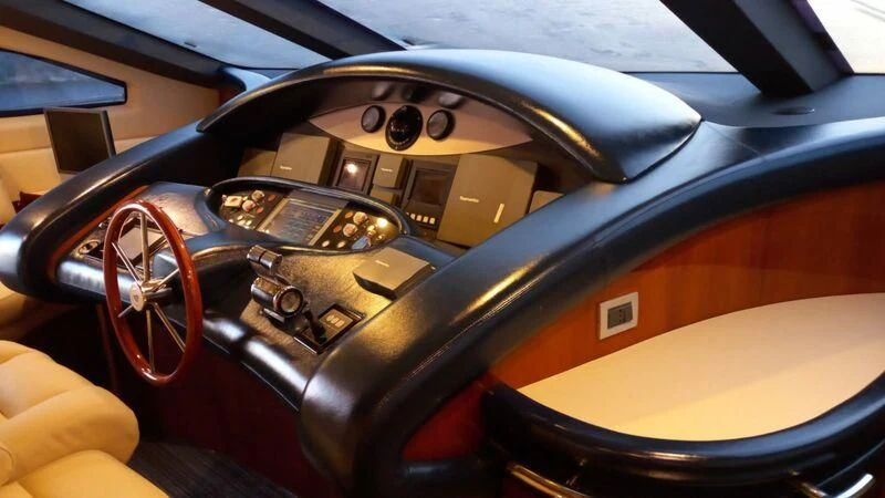 the inside of a car aboard AEGINA Yacht for Sale