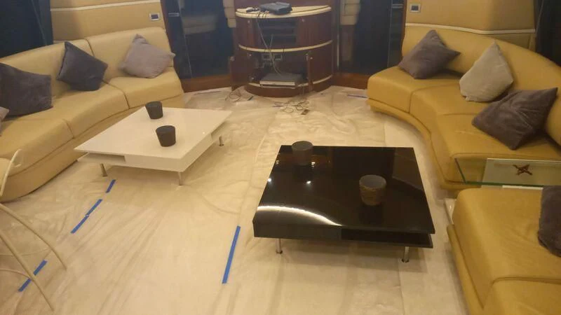 a table with a black tray on it aboard AEGINA Yacht for Sale