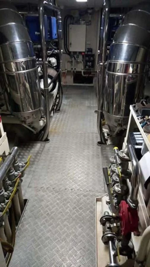 a room with several large metal pipes aboard AEGINA Yacht for Sale