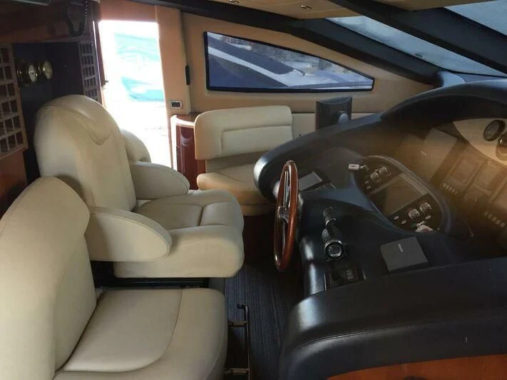 the inside of a car aboard AEGINA Yacht for Sale