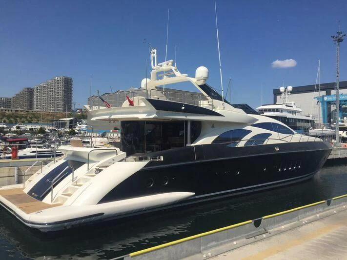 a boat docked at a pier aboard AEGINA Yacht for Sale