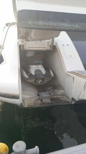 a machine with a large piece of paper in it aboard AEGINA Yacht for Sale