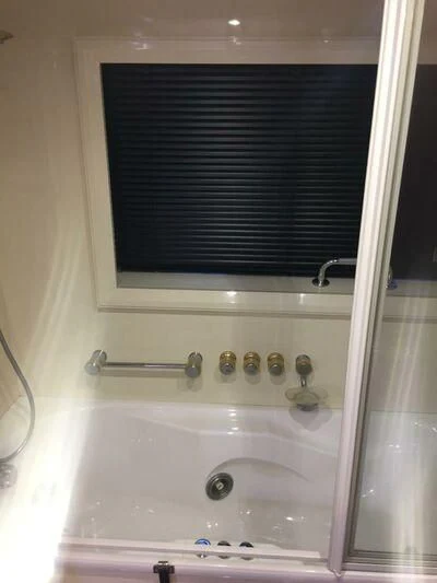 a bathroom sink with a faucet aboard AEGINA Yacht for Sale