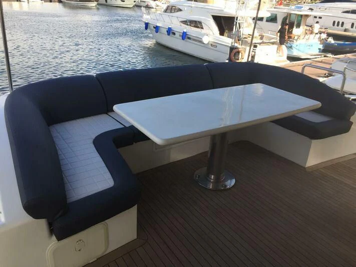 a table on a boat aboard AEGINA Yacht for Sale