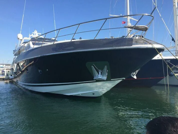 a boat docked at a pier aboard AEGINA Yacht for Sale
