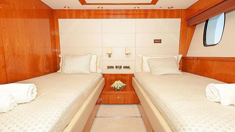 a room with two beds aboard YVONNE Yacht for Sale