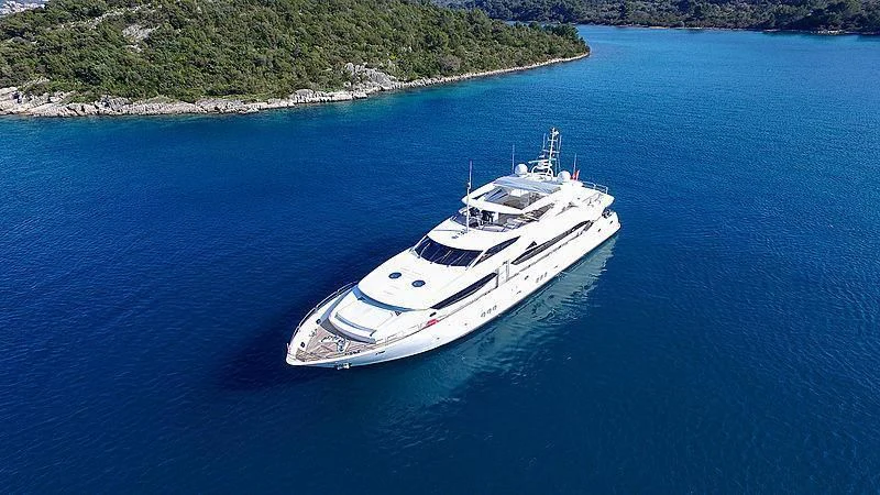 a white boat in the water aboard YVONNE Yacht for Sale