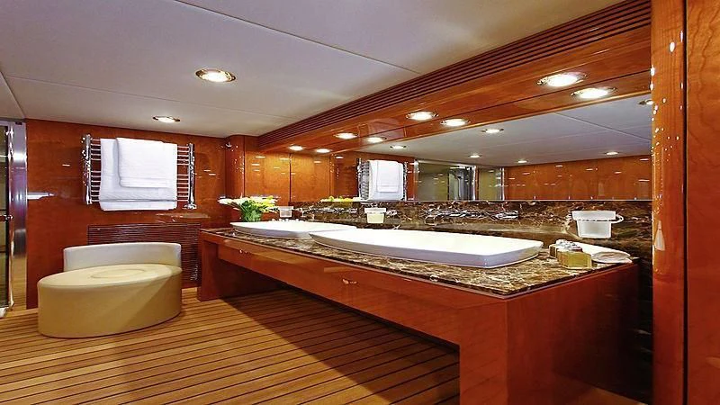 a large bathroom with a large tub aboard YVONNE Yacht for Sale