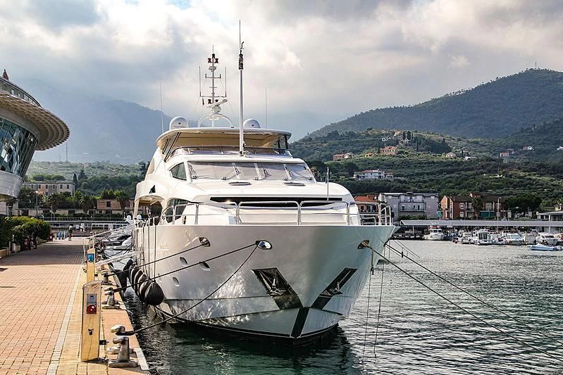 a boat docked at a pier aboard YVONNE Yacht for Sale