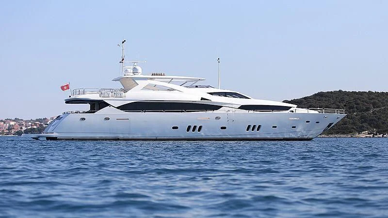 a white yacht on the water aboard YVONNE Yacht for Sale