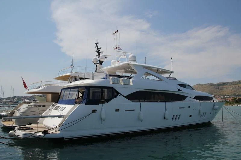 a white yacht on the water aboard YVONNE Yacht for Sale