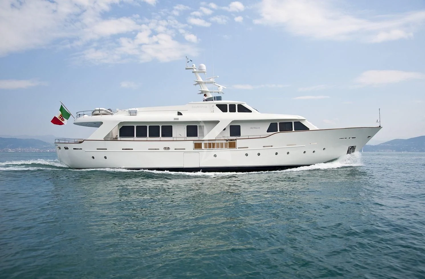 a white boat in the water aboard MRS. WHITE Yacht for Sale