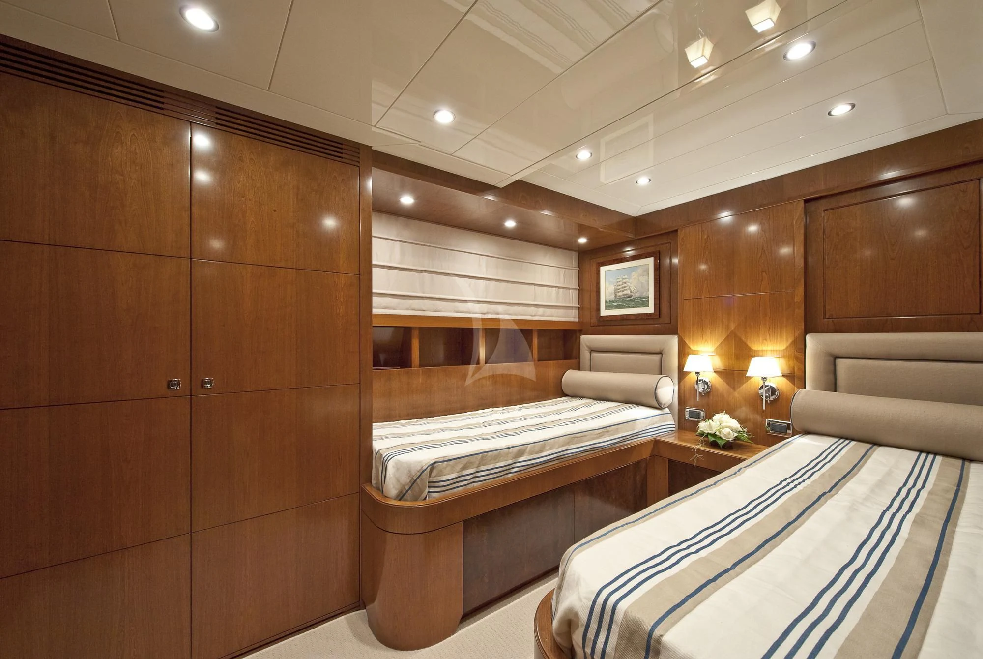 a room with a bed and a couch aboard MRS. WHITE Yacht for Sale