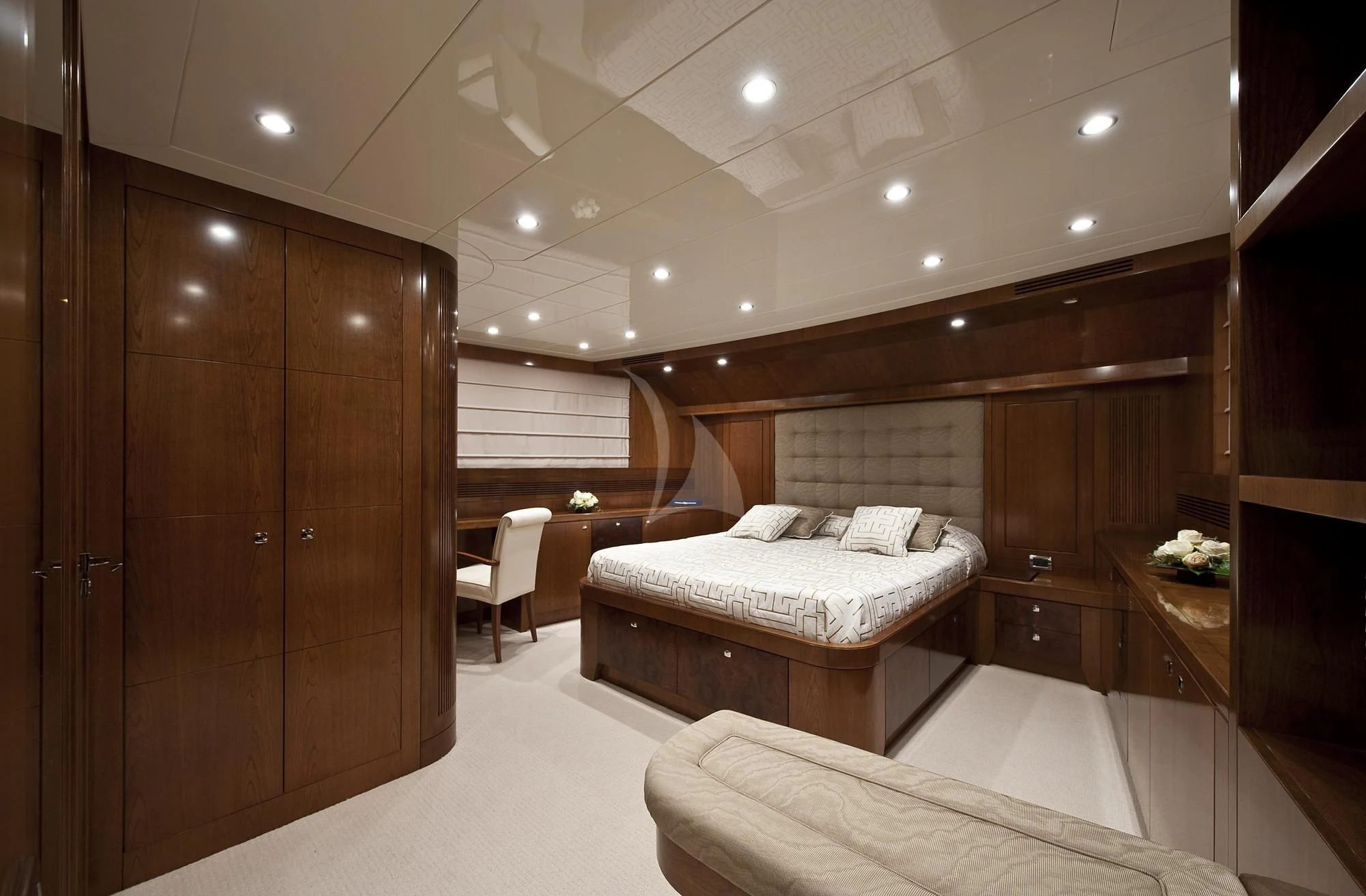 a room with a bed and a desk aboard MRS. WHITE Yacht for Sale