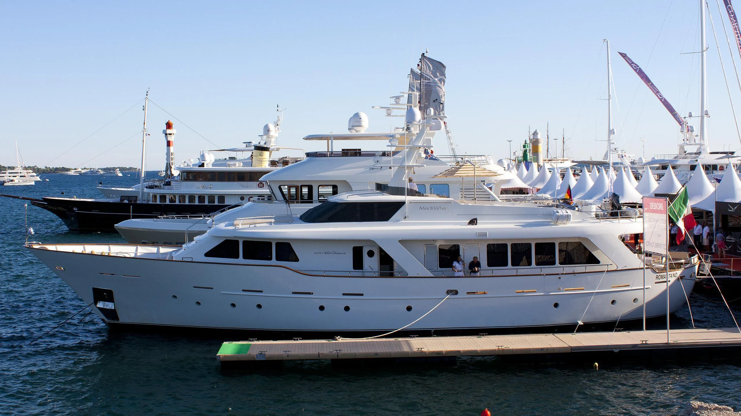 a large white boat on the water aboard MRS. WHITE Yacht for Sale