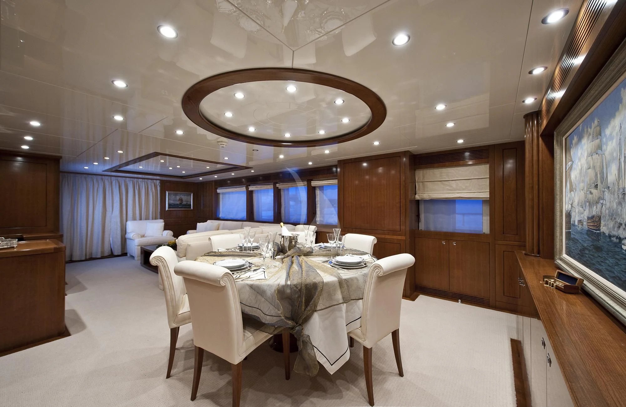 a large room with a table and chairs aboard MRS. WHITE Yacht for Sale