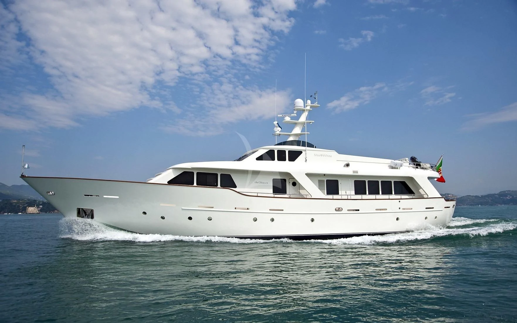 a white boat on the water aboard MRS. WHITE Yacht for Sale