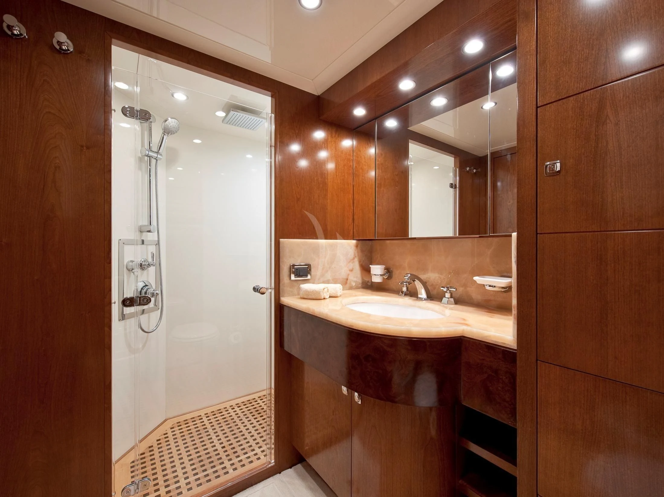 a bathroom with a shower and sink aboard MRS. WHITE Yacht for Sale