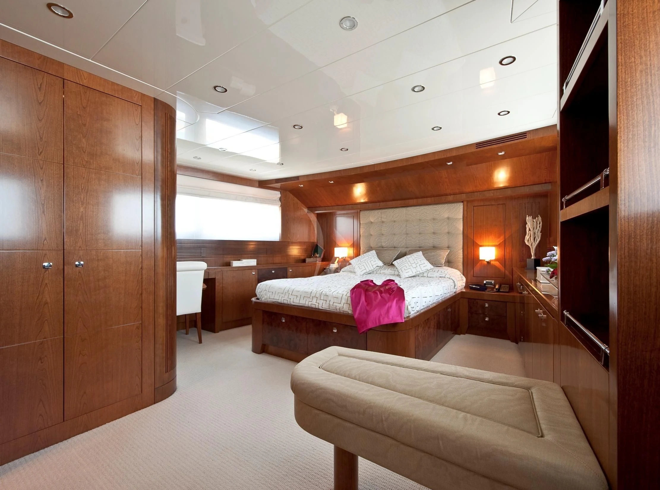 a room with a bed and a couch aboard MRS. WHITE Yacht for Sale