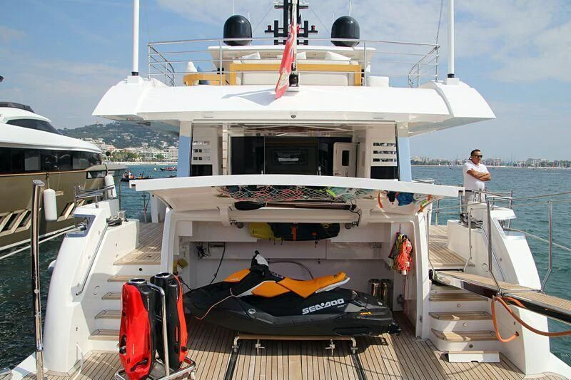 a boat docked at a pier aboard GOLD STAR Yacht for Charter