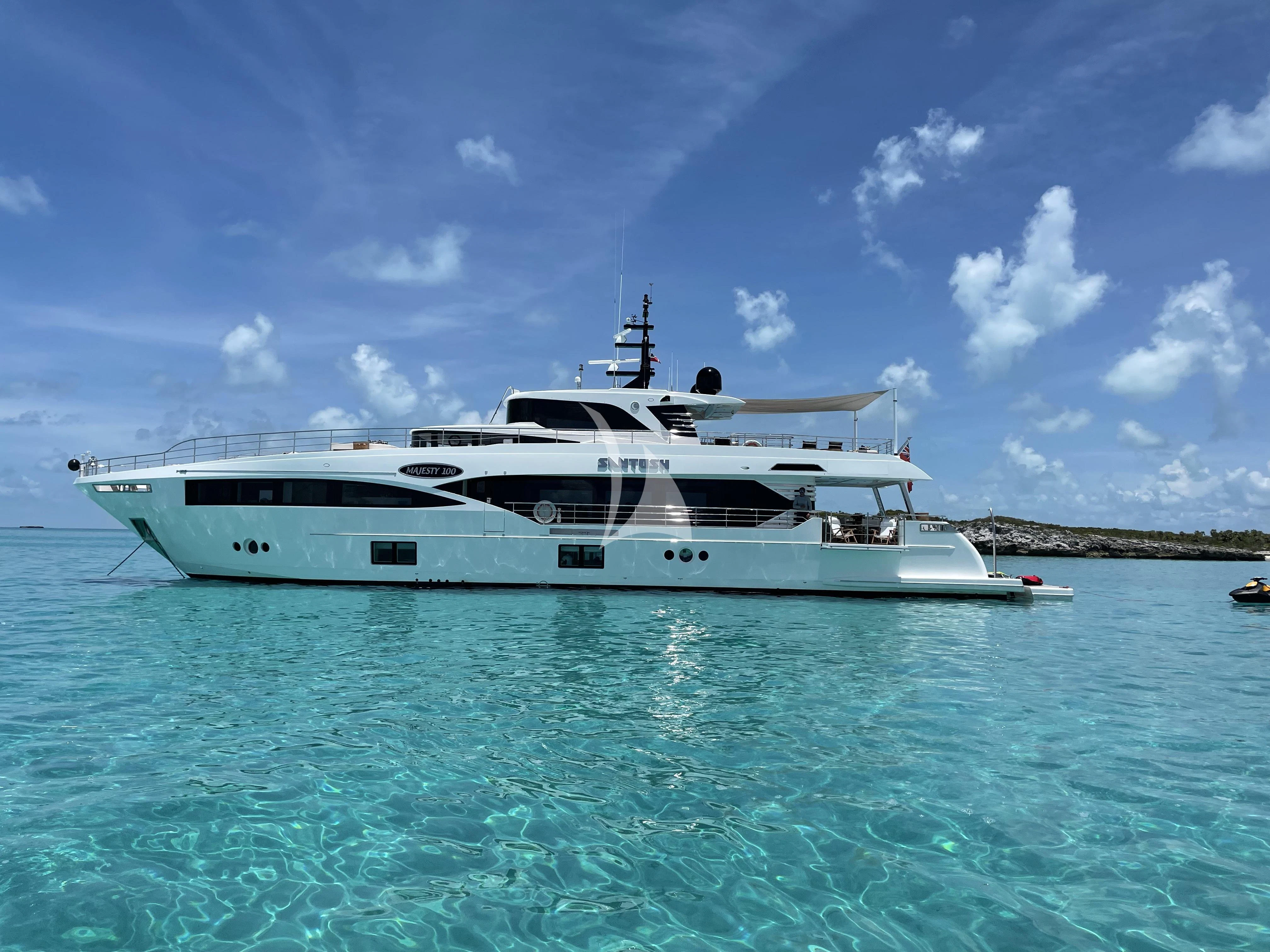 a white yacht in the water aboard GOLD STAR Yacht for Charter
