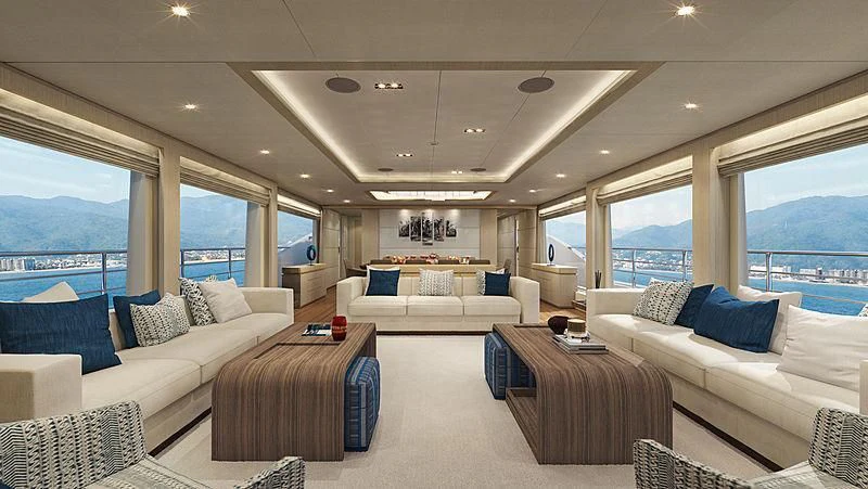 a room with a bed and a large window aboard GOLD STAR Yacht for Charter