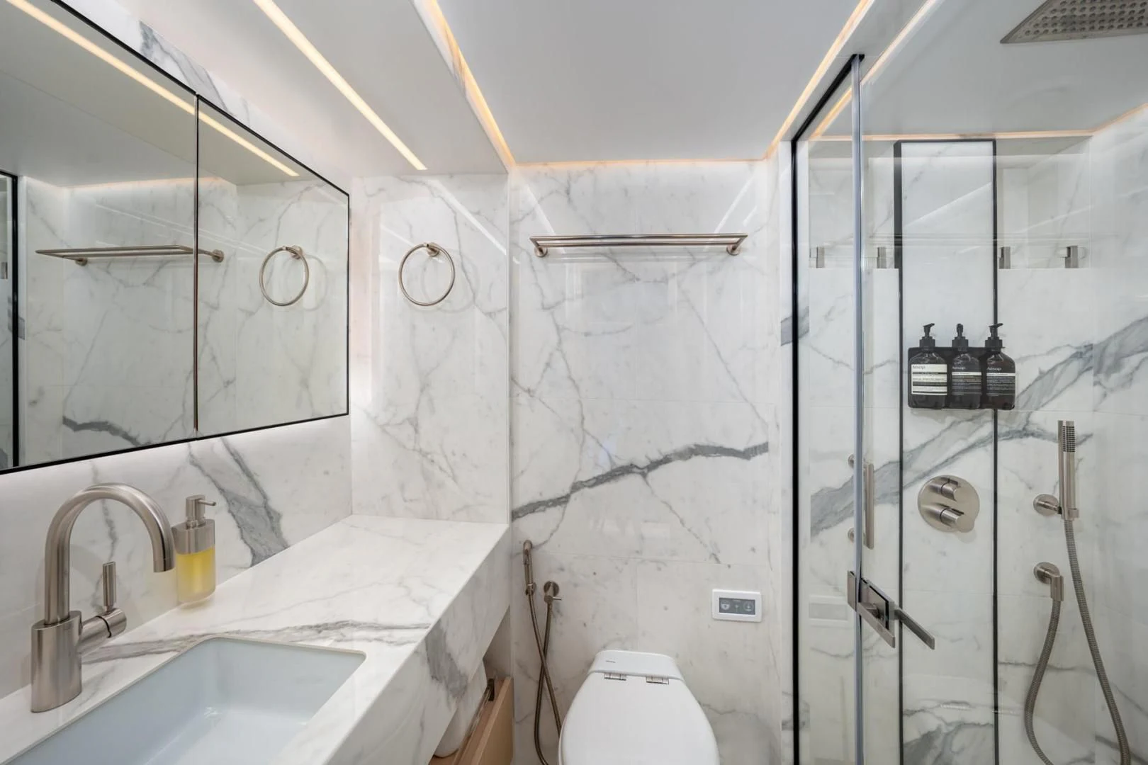 a bathroom with a shower and sink aboard GOLD STAR Yacht for Charter